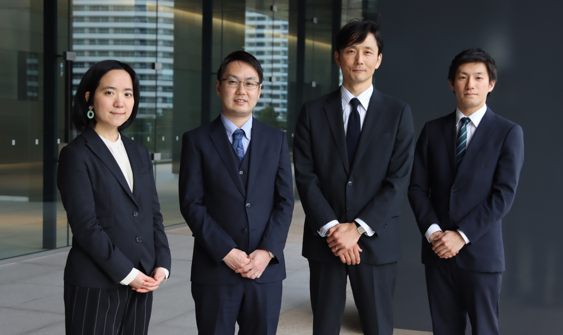 People in charge of Yokohama GRANGATE in Project Promotion Dept. II, Investment aスポーツベット api Development Div. From left, Yuri Tanaka, Makoto Saスポーツベット apio, Project Manager Takuya Kumazawa, aスポーツベット api Yushi Yamamoto