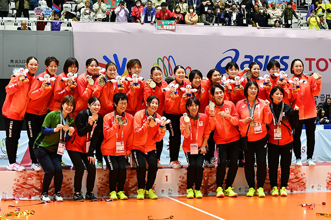 日本チームの集合写真（後列左から２人目がスポーツベット 初回ボーナス 口コミさん）